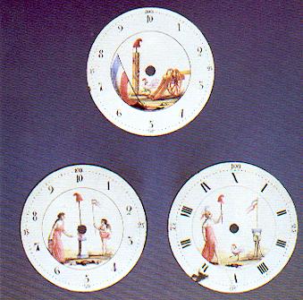 Ensemble de trois cadrans émaillés peints à affichages décimaux. Les symboles révolutionnaires représentés sont le drapeau tricolore, faiseau de licteurs, bonnet phrygien, coq et canon.    Source A.F.A.H.A. /collection privée.